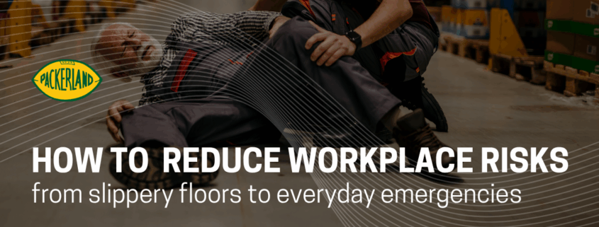 A man in his 60's lays on the floor clutching his legs and hips, his face visibly in pain. Next to him, another man whose face is not shown is crouching down to try to assist the injured man. He is wearing a red apron. Behind them are pallets of items that are slightly blurred, suggesting they are at work.